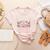 In October Pre-K Teachers Wear Pink Ribbon Breast Cancer Women's Heather T-Shirt Heather Peach