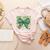 One Lucky Teacher Coquette Bow St Patricks Day Teacher Women's Heather T-Shirt Heather Peach