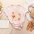 Read In Peace Skeleton Reading Book Halloween Teacher Women's Heather T-Shirt Heather Peach