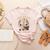 Weird Teachers Build Character Skeleton Book Halloween Women Women's Heather T-Shirt Heather Peach
