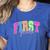 Back To School Neon Checkered First Grade Colorful Teacher Women's Heather T-Shirt Heather True Royal