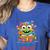 Feed The Reading Monster Halloween Teacher Women's Heather T-Shirt Heather True Royal Feed The Reading Monster Halloween Teacher Women's Heather T-Shirt Heather True Royal
