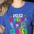 Feliz Primer Dia De Clases Kids Girl Teacher Spanish School Women's Heather T-Shirt Heather True Royal Feliz Primer Dia De Clases Kids Girl Teacher Spanish School Women's Heather T-Shirt Heather True Royal