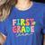 First Grade Team Teacher Back To School 1st Grade Squad Kids Women's Heather T-Shirt Heather True Royal