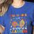 Groovy Fall In Love With Learning Autumn Pumpkin Teacher Women's Heather T-Shirt Heather True Royal