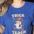 Halloween Teacher Shirts Women School Trick Or Teach Groovy Women's Heather T-Shirt Heather True Royal