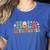 Hola Estudiantes Spanish Teacher Women's Heather T-Shirt Heather True Royal Hola Estudiantes Spanish Teacher Women's Heather T-Shirt Heather True Royal