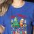One Merry Teacher Groovy Christmas Tree Pjs Xmas Teacher Women's Heather T-Shirt Heather True Royal
