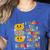 I Teach The Cutest Pumpkins Kindergarten Teacher Halloween Women's Heather T-Shirt Heather True Royal