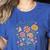 Teach Them Love Them Watch Them Grow Retro Teacher Floral Women's Heather T-Shirt Heather True Royal Teach Them Love Them Watch Them Grow Retro Teacher Floral Women's Heather T-Shirt Heather True Royal