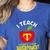I Teach What's Your Superpower Superhero Teacher Women's Heather T-Shirt Heather True Royal