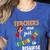 Teachers Are Superheroes Graduation School Teachers Women's Heather T-Shirt Heather True Royal