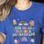 The Tired Teachers Department Retro Groovy Back To School Women's Heather T-Shirt Heather True Royal The Tired Teachers Department Retro Groovy Back To School Women's Heather T-Shirt Heather True Royal