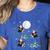 Xmas Tree Santa Riding Boston Terrier Christmas Women's Heather T-Shirt Heather True Royal