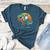 Boston Terrier Dog Riding Dinosaur T Rex Boys Women's Heather T-Shirt Heather Deep Teal