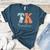 TK Teacher Retro Groovy Vintage Happy First Day Of School Women's Heather T-Shirt Heather Deep Teal