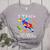 Autism Awareness Teacher I Teach Awesome Superheroes Women's Heather T-Shirt Athletic Heather