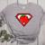 Cute Distressed Super Teacher Superhero Apple Shirt Women's Heather T-Shirt Athletic Heather Cute Distressed Super Teacher Superhero Apple Shirt Women's Heather T-Shirt Athletic Heather
