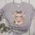 Cute Floral Highland Cow Back To School For Women Teacher Women's Heather T-Shirt Athletic Heather