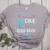 Cute Mermaid Librarian Teacher Dive Into A Good Book Reading Women's Heather T-Shirt Athletic Heather