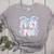 First Grade Coquette Bow Girls Teacher Team 1st Grade Squad Women's Heather T-Shirt Athletic Heather