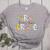 First Grade Dream Team Back To School 1st Grade Teacher Women's Heather T-Shirt Athletic Heather