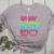 In My Glowing Teacher Era Groovy Colorful Bright Women's Heather T-Shirt Athletic Heather