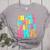In My Glowing Teacher Era Groovy Colorful Bright Women's Heather T-Shirt Athletic Heather In My Glowing Teacher Era Groovy Colorful Bright Women's Heather T-Shirt Athletic Heather