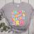 In My Glowing Teacher Era Teaching Back To School Women's Heather T-Shirt Athletic Heather In My Glowing Teacher Era Teaching Back To School Women's Heather T-Shirt Athletic Heather