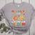 Groovy Fall In Love With Learning Autumn Pumpkin Teacher Women's Heather T-Shirt Athletic Heather