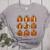 Halloween Teacher Fall Book Pumpkin Retro Reading Women's Heather T-Shirt Athletic Heather Halloween Teacher Fall Book Pumpkin Retro Reading Women's Heather T-Shirt Athletic Heather