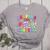 Helping Little Minds Grow Teacher Life Back To School Women's Heather T-Shirt Athletic Heather