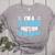 I'm A PE Teacher What's Your Superpower Physical Education Women's Heather T-Shirt Athletic Heather