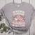 In October 2nd Grade Teachers Wear Pink Ribbon Breast Cancer Women's Heather T-Shirt Athletic Heather