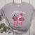 In October We Wear Pink Apple Teacher Daisy Breast Cancer Women's Heather T-Shirt Athletic Heather