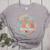 Pre-K Dream Team Back To School Teacher Flower Women's Heather T-Shirt Athletic Heather