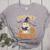 Spooky Teacher Halloween Cute Ghost Pumpkin Reading Women Women's Heather T-Shirt Athletic Heather