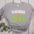 Teachers Love Brains Halloween Teacher Zombie Women's Heather T-Shirt Athletic Heather