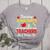 Teaching Assistant Because Teachers Need Heroes Too Cute Women's Heather T-Shirt Athletic Heather Teaching Assistant Because Teachers Need Heroes Too Cute Women's Heather T-Shirt Athletic Heather