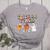 Trick Or Teach Candy Corn Pumpkin Ghost Teacher Women's Heather T-Shirt Athletic Heather