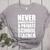 Never Underestimate A Private School Teacher Back To School Women's Heather T-Shirt Athletic Heather Never Underestimate A Private School Teacher Back To School Women's Heather T-Shirt Athletic Heather