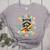Weird Teachers Build Character Raccoon Colourful Floral Women's Heather T-Shirt Athletic Heather Weird Teachers Build Character Raccoon Colourful Floral Women's Heather T-Shirt Athletic Heather