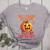 Will Trade Students For Candy Teacher Cute Halloween Pumpkin Women's Heather T-Shirt Athletic Heather