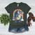 Boston Terrier Riding Dinosaur T-Rex Boys Kids Rainbow Women's Heather T-Shirt Heather Forest