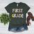 First Grade Dream Team Back To School 1st Grade Teacher Women's Heather T-Shirt Heather Forest