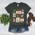 Merry And Bright Christmas Gingerbread Santa Book Teacher Women's Heather T-Shirt Heather Forest Merry And Bright Christmas Gingerbread Santa Book Teacher Women's Heather T-Shirt Heather Forest