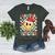 Santas Favorite Teacher Retro Groovy Smile Face Christmas Women's Heather T-Shirt Heather Forest Santas Favorite Teacher Retro Groovy Smile Face Christmas Women's Heather T-Shirt Heather Forest