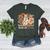 Trick Or Teach Groovy Teacher Halloween Floral Ghost Women's Heather T-Shirt Heather Forest Trick Or Teach Groovy Teacher Halloween Floral Ghost Women's Heather T-Shirt Heather Forest