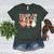 Trick Or Teach Pumpkin Candy Corn Ghost Halloween Teacher Women's Heather T-Shirt Heather Forest