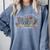 Groovy Tiny Human Tamer Floral Kindergarten Teacher Comfort Colors Sweatshirt Blue Jean